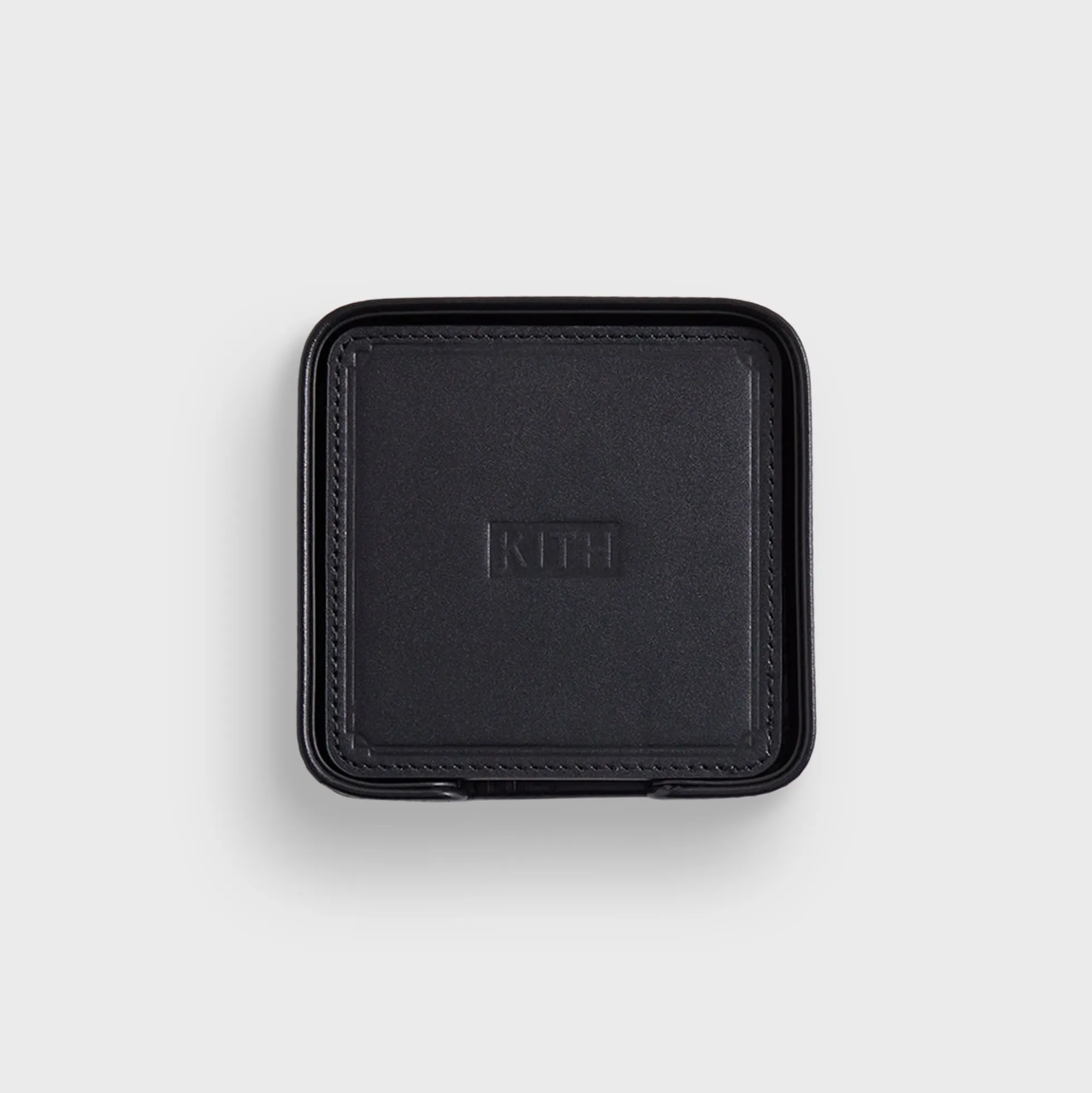 Dessous de verre en cuir monogramme Kith