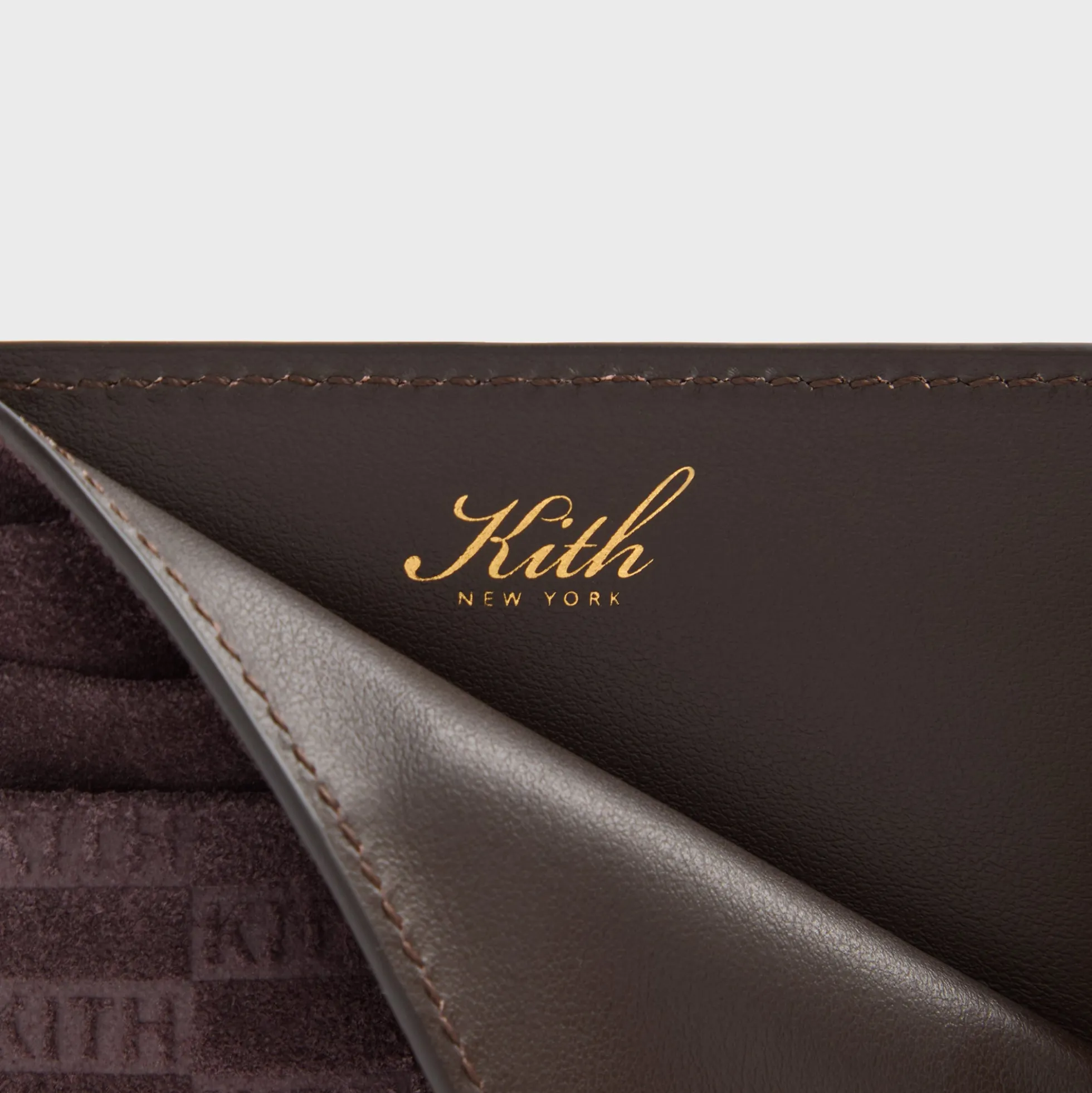 Porte-cartes en daim monogramme Kith